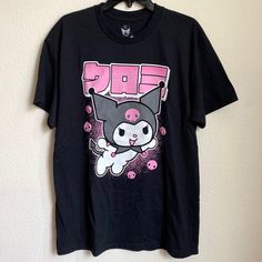 Sanrio Kuromi Black 100% Cotton Boyfriend Fit T- Shirt Sz Large Brand New Without Tags. This Black Tee Features An Image Of Kuromi With Japanese Text Above. 100% Cotton Wash Cold; Dry Low Imported Kuromi Tshirts, Kawaii Black T-shirt With Letter Print, Black Kawaii T-shirt With Character Print, Kawaii Black Crew Neck T-shirt, Cute Black Short Sleeve T-shirt, Kawaii Black T-shirt With Screen Print, Kawaii Black Top With Character Print, Black Kawaii Top With Character Print, Kawaii Black Top For Streetwear