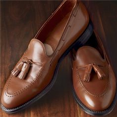 Classic Leather Business Shoes With Tassels, Classic Slip-on Moccasins With Tassels, Classic Business Moccasins With Tassels, Classic Formal Moccasins With Tassels, Classic Tassel Slip-on Loafers, Classic Wingtip Tassel Dress Shoes, Classic Wingtip Dress Shoes With Tassels, Classic Formal Leather Shoes With Tassels, Classic Leather Tassel Loafers