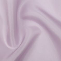 There is no reason to lilac motivation with this Lilac Shimmering Polyester Twill Organdy. Organdy is a structured fabric, with this material's twill weave providing the shimmering pale purple base with a subtle diagonal line pattern. With a crisp feel and voluminous drape, use this for overlays in billowing gowns, blouses, puffy sleeves, and full pleated skirts. Translucent, use a lining for more opacity if desired. Elegant Purple Silk Fabric, Organdy Fabric, Lilac Fabric, Structured Fabric, Prom Dress Inspo, Diagonal Line, Pale Purple, Lavender Pink, Pleated Skirts