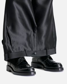 Comme des Garcons HOMME PLUS Upside Down Pants in Black. These pants feature a zip fly and button closure, four-pocket styling and functional zip fly and button waistband at the bottom hem. Comme Des Garcons Pants, Comme Des Garcons Vintage, Vintage Pants, Pant Shirt, Comme Des Garcons, Upside Down, Black Pants, Casual Pants, Fitness Models