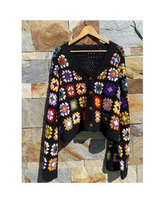 Black Granny Square Crochet Cardigan, Granny Square Cardigan, Women's Crocheted Cardigan, Long Sleeves Crochet Cardigan ✅This Cardigan you can wear at dating, shopping, vacation, work, leisure, party, daily wear, and other occasions that will make you look attractive. This loose cardigan sweaters will become essential trendy cardigans this season. Exquisite sweaters with cute scarves or beautiful necklaces will make you more eye-catching, become the focus of the crowd, and gain compliments from Black Patchwork Sweater For Spring, Black Bohemian Crochet Cardigan, Black Bohemian V-neck Cardigan, Black Granny Square Sweater For Fall, Fall Crochet V-neck Cardigan, Bohemian Black Cardigan With Granny Square, Black Bohemian Cardigan With Granny Square Details, Black Long Sleeve Granny Square Cardigan, Black Sweater With Granny Square For Fall