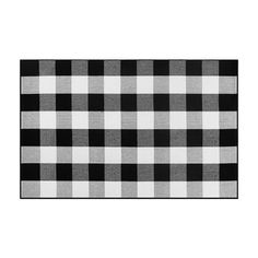 a black and white checkered rug on a white background