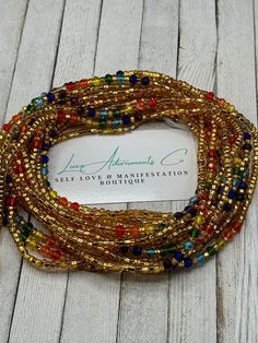 "Welcome to Luxe Adornments, where our handmade designs by Vee Webb meet spirituality, self-love, and balance. Our Matte Chakra Waist Beads are the perfect addition to any outfit or personal ritual. 💫💖 Each chakra is associated with a color and energy center in the body. The 7 chakras include: Root chakra - Red Sacral chakra - Orange Solar plexus chakra - Yellow Heart chakra - Green Throat chakra - Blue Third Eye chakra - Indigo Crown chakra - Violet Our waist beads are made with high-quality Spiritual Round Waist Beads As A Gift, Spiritual Style Waist Beads As A Gift, Spiritual Style Waist Beads For Gift, Bohemian Adjustable Waist Chain With 108 Beads, Handmade Waist Beads As A Gift, Handmade Waist Beads As Gift, Bohemian Waist Beads As A Gift, Bohemian Multi-strand Waist Beads With Spacer Beads, Handmade Bohemian Waist Chain With Round Beads