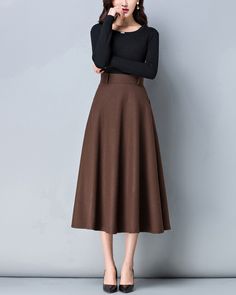 * A high-end long wool skirt with wide hem, very cool. * Made of wool blends, fully lined and with two side pockets. * Fixed waist with wide waistband and side invisible zipper. * Can custom make waist size and skirt length. * Material: Outer-50% wool, 50% polyester; lining-100% polyester * Washing instructions: Dry Clean Only * Size: True to US size, US 0-US 20 are available, you can let us know your usual size and height in your order. * Shipping: Free shipping Processing time : 5-7 Business d Long Skirt Vintage, A Line Skirt Outfits, Midi Skirt Winter, Long Wool Skirt, Dark Grey Skirt, Skirt Winter, Oliver Wood, Skirt Ideas, Denim Shorts Outfit