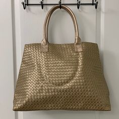 Nwot But Comes Brand New In Original Plastic Bag! Golden Woven Leather Pattern! Color Is Gorgeous! Inside Is One Main Compartment And Has Pockets On The Side Of The Interior! Magnet Snap Closure Size Is Pretty Jumbo To Me! Feel Free To Check Dimensions Below! Elegant Tan Bags With Braided Handles, Tan Shoulder Bag With Braided Double Handles, Gold Top Handle Shoulder Bag With Leather Handles, Chic Gold Shoulder Bag For Travel, Gold Tote Satchel With Large Capacity, Gold Satchel With Large Capacity Tote Shape, Gold Hobo Bag With Detachable Handle For Daily Use, Gold Large Capacity Tote Satchel, Chic Gold Hobo Bag With Large Capacity