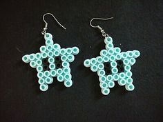 pair of beaded earrings with star design on them, made out of plastic beads