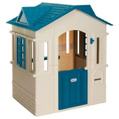 a toy house with a blue door and windows