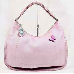 Authentic Fendi Large Metallic Pale Pinkish Purple Romano Selleria Leather Hobo Bag Features Crafted From A Pebble Grained Metallic Calfskin Selleria Leather In A Pale Pink-Purple Hue Tonal Hand-Crafted Whip Stitching Butterfly Charm On Front Of Handbag Silvertone Hardware Single Braided Strap Fendi Silvertone Metal Nameplate Top Zip Closure Large Interior Main Compartment Two Large Slip Pockets Size 16”W X 11”H X 4”D Handle Drop :: 7” Condition This Satchel Is In Excellent Preloved Condition Displaying Minor Signs Of Wear Inside And Out Including Light Scuffs And Rubbing In Places, A Bit Of Creasing, And Some Light Scratches On The Bottom An Pink Double Handle Shoulder Bag With Palladium Hardware, Pink Shoulder Bag With Palladium Hardware And Double Handle, Elegant Purple Shoulder Bag With Palladium Hardware, Luxury Purple Shoulder Bag With Silver-tone Hardware, Pink Leather Hobo Bag With Handles, Pink Leather Hobo Bag With Detachable Handle, Pink Top Handle Hobo Bag For Evening, Pink Evening Hobo Bag With Top Handle, Elegant Purple Satchel Hobo Bag