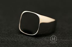 ► Material: High quality steel ► Color: Vintage Silver, ► Comfortable fit ►Strap width: 8mm ► Dimensionally accurate. ►100% cobalt-free ► Hypoallergenic ► Ordinary ring box  The uniqueness of this ring, which features a flat black top set in a silver tone, is undoubtedly a new interpretation of vintage fashion. The body is crafted from medical-grade stainless steel for durability and durability, while the striking flat black top is the finishing touch. The contrast between silver and black not only highlights its sophistication and boldness, but also makes it a versatile accessory that can be easily worn with any outfit. Whether it's a formal occasion or a casual moment, it can add a touch of unique charm to the overall look. Its simple yet individual design style makes this ring the perfe Minimalist Stainless Steel Signet Ring With Polished Finish, Black Minimalist Signet Ring For Everyday, Modern Black Signet Ring With Polished Edges, Modern Rectangular Stainless Steel Signet Ring, Modern Stainless Steel Rectangular Signet Ring, Formal Rectangular Stainless Steel Signet Ring, Formal Stainless Steel Rectangular Signet Ring, Modern Stainless Steel Signet Ring For Anniversary, Everyday Black Signet Ring With Polished Finish