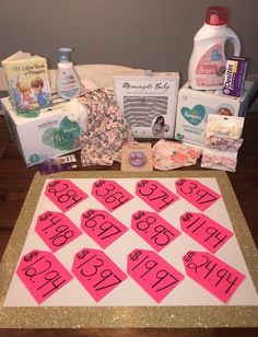 a table topped with lots of pink and white items