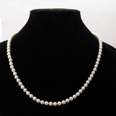 "Mikimoto vintage Cultured Pearl strand necklace, having 18 K (.750) yellow gold clasp, accented with a Seed Pearl. The Pearls measure 6-6.5 mm. This elegant necklace is 22\" long and weighs 30.7 grams. EA2209" Classic Jewelry With Sterling Silver Clasp, Formal Single Strand Round Necklace, Timeless Formal Necklace With Sterling Silver Clasp, Timeless Round Bead Necklace For Anniversary, Timeless Round Beads Necklace For Anniversary, Classic Single Strand Necklace For Anniversary, Classic Pearl Necklace With Jewels For Anniversary, Classic Formal Jewelry With Round Beads, Single Strand Round Necklace For Anniversary