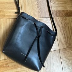 First Edition Mansur Gavriel Bucket Bag. Genuine Black Leather With Classic Red Interior. Made In Italy Mansur Gavriel Bucket Bag, Red Interior, Mansur Gavriel, Red Interiors, Bucket Bag, Black Red, Black Leather, Black And Red, In Italy