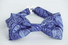 Dapper Blue Satin Bow, Blue Bow With Bow Tie Back For Wedding, Blue Bow Tie For Wedding, Blue Bow Tie With Bow Tie Back For Weddings, Elegant Blue Adjustable Bow Tie, Blue Wedding Bow Tie With Bow Tie Back, Blue Satin Bow Tie For Black-tie Events, Blue Satin Bow Tie For Weddings, Blue Tie With Bow Tie Back As A Gift