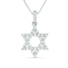 Faith meets fashion in this dazzling Star of David diamond pendant. Crafted in 18K white gold, this shimmering open design is fully lined with sparkling diamonds boasting a color rank of G and clarity of Si2. Striking with 1/6 ct. t.w. of diamonds and a brilliant buffed luster, this pendant suspends from a diamond-lined bail along an 18.0-inch box chain that secures with a spring-ring clasp. Judaica Jewelry, Star Of David Pendant, Gold G, Diamond Star, Open Design, Star Of David, Sparkle Diamonds, Box Chain, Diamond Stone