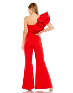 Crafted from quality crepe fabric, our One Shoulder Ruffle Detail Flare Pant Jumpsuit features a trendy one shoulder neckline and elegant ruffle detailing. With its flattering flare pant and stylish silhouette, this jumpsuit is perfect for any occasion. Ieena for Mac Duggal Crepe Fabric (100% polyester) Fully lined One shoulder neckline Ruffle detail Concealed back zipper Available in Black and Red Style #27460 Robe Fuchsia, Prom Jumpsuit, Champagne Formal Dresses, Vestidos Color Coral, Modest Formal Dresses, Green Homecoming Dresses, Light Blue Prom Dress, Navy Blue Bridesmaid Dresses, Blue Sequin Dress