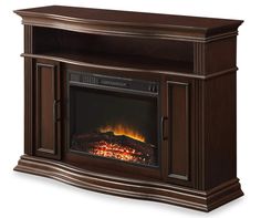 an entertainment center with a fireplace in it