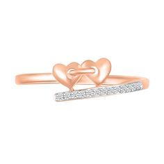 Reinvent romantic expression with the playful linked and bypassing details of this diamond double heart promise ring. Crafted in precious 10K rose gold A pair of sculpted hearts - joined in a link-like design - punctuates one bypassing ribbon. Diamonds line the opposite side to complete the look. This promise ring shines with 1/20 ct. t.w. of diamonds. Rose Gold Rings With Diamond Accents For Valentine's Day, Rose Gold Double Heart Promise Ring, Rose Gold Diamond Ring For Valentine's Day, Rose Gold Double Heart Rings For Valentine's Day, Heart Promise Rings, Peoples Jewellers, Double Heart, Promise Ring, Promise Rings