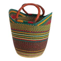 a multicolored woven basket with wooden handles on a white background, isolated for use as a purse or tote bag