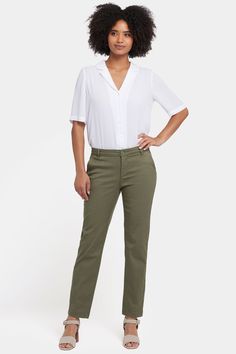 NYDJ's Sadie Slim Pants in soft stretch twill are an absolute closet staple. Polished and sophisticated, they'll elevate your look every time. Features front slash pockets, back welt pockets, belt loops and a zip fly with hidden button closure. This pant is made with earth-friendly methods that result in reduced consumption of water, chemicals and/or energy. | NYDJ Women's Sadie Slim Pants in Avocado, Regular, Size: 8 Spring Workwear Pants With 5-inch Inseam, Mid-rise Relaxed Fit Dress Pants For Business Casual, Casual Office Dress Pants With 4-way Stretch, Classic Elastane Chinos For Workwear, Casual Dress Pants With 4-way Stretch For Office, Elastane Chinos For Workwear With Straight Hem, Elastane Chinos For Workwear With Straight Leg, 4-way Stretch Straight Leg Chinos For Work, Straight Leg Chinos With 4-way Stretch For Work