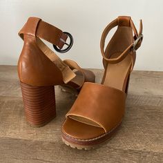 Nwot Perfect For Summer Brown Block Heels With Buckle Closure And Round Toe, Faux Leather Heels With Heel Loop And Round Toe, Faux Leather Heels With Stacked Heel And Round Toe, Faux Leather Sandals With 4-inch Heel, Faux Leather Sandals With 4-inch Open Heel, Open Toe Heels With Heel Strap In Faux Leather, 4-inch Open Toe Faux Leather Heels, Faux Leather Sandals With Padded Wedge Heel, High Heel Sandals With Heel Strap In Faux Leather