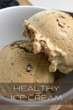 two scoops of ice cream in a bowl with the words healthy ice cream on it