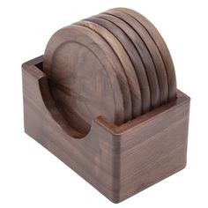 a set of wooden coasters in a holder