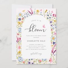 an elegant floral wedding card with the words bloom on it