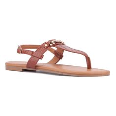 Enjoy a laid-back style with the Angelica sandal, featuring a traditional t-strap design with an ankle strap for minimalistic elegance. Perfect for sunny days, its comfortable fit and versatile styling make it ideal for leisurely outings. Whether paired with shorts, skirts or casual dresses, the Angelica sandal ensures you stay cool and stylish wherever your day takes you. Spring T-strap Sandals With Adjustable Toe Post, Summer T-strap Toe Post Sandals With Adjustable Strap, Spring Toe Post T-strap Sandals With Adjustable Strap, Spring T-strap Sandals With Adjustable Strap, Vacation T-strap Sandals With Adjustable Strap, Beach T-strap Sandals With Adjustable Strap, Summer Flat Adjustable T-strap Sandals, Adjustable Ankle Strap Slingback Sandals For Summer, Adjustable Ankle Strap Slingback Sandals