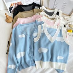 Cute V neck camisole with cardigan sweaterFabric: blendedColor: black, pink, blue, greenSize(cm): free size(1inch=2.54cm)Camisolelength 47cm bust 84-110cmSweater&ltp&gtlength 50cm bust 88-110cm&lt/p&gt&ltbr/&gt&ltp&gtPlease check the size carefully when you choose items.&lt/p&gt&ltbr/&gt&ltp&gtFor more pictures of the dress, please contact us, thank you.&lt/p&gt&ltbr/&gt Trendy Blue Sleeveless Sweater, Trendy Sleeveless Blue Sweater, Trendy Blue Knit Vest, Trendy V-neck Summer Sweater, Blue V-neck Sweater For Summer, Casual Summer Sweater Vest, Blue V-neck Summer Sweater, Pink V-neck Sweater Vest For Summer, Trendy Pink Sleeveless Sweater