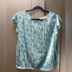 Loft Short Sleeved Blouse, Size L. Green/Blue W/ Yellow Florals, Elastic Waist. Never Worn, Excellent, Like New Condition. Printed Blue Rayon Top, Blue Printed Rayon Top, Blue Rayon Tops For Day Out, Short Sleeved Blouse, Short Sleeve Blouse, Elastic Waist, Blue Green, Color Blue, Loft