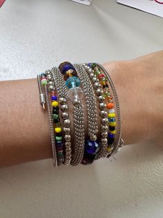 This Wrap Bracelet features colorful beads and an oxidized finish. The unique design allows for versatility in styling, adding a touch of color and texture to any outfit. Crafted with high-quality materials, it is a must-have accessory for any fashion-forward individual. One size fits all. Color And Texture, Dhoti Pants, End Of Season Sale, New Instagram, Festival Wear, Wrap Bracelet, One Size Fits All, Unique Design, Fashion Forward