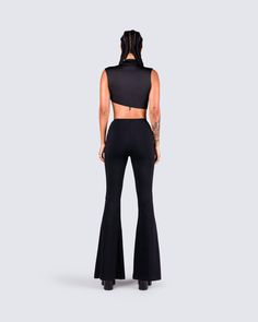 An all-black fit always exudes a "don't mess with me" kind of vibe 😈 Intimidate and entice them all with this 2 piece set, featuring a black turtleneck crop top, paired with black lace-up flared pants 🖤 Stretch High Neck Crop Top For Night Out, High Stretch Black High Neck Crop Top, Black Stretch High Neck Crop Top, Edgy High Stretch Crop Top For Night Out, Edgy Stretch Crop Top For Night Out, Edgy High-stretch Crop Top For Night Out, Edgy Stretch Crop Top For Evening, High Stretch Chic Black Crop Top, Black High Stretch Crop Top For Party