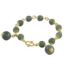 Adorn your wrists with timeless jade! Somluck Komolmith of Thailand handcrafts this beautiful design. Combining 18k gold plated brass with cool gemstone globes her bracelet features jade beads and a hook clasp. Gold Agate Gemstone Bracelets, Yellow Gold Jade Round Beads Jewelry, Yellow Gold Jade Beaded Jewelry, Gold Jade Beaded Bracelets With Gemstones, Handmade Gold Jade Beaded Bracelets, Gold Jade Beaded Bracelets, Gold Jade Bangle Bracelet, Gold Jade Beaded Bracelets With Natural Stones, Gold Aventurine Round Bead Bracelets