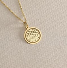 14K Real Solid Gold Flower Of Live  Pendant ● Material of pendant: Solid Gold 14k ( REAL GOLD ) ● Metal Stamp: 14L ( REAL GOLD ) ● The pendant is available in 6 sizes: - 14,0 mm / 0,55 inches ( Diameter ) In the photos - 15,3 mm / 0.60 inches ( Diameter ) - 16,5 mm / 0,65 inches ( Diameter ) - 19,1 mm / 0,75 inches ( Diameter ) - 21 mm / 0,82 inches ( Diameter ) - 23 mm / 0.90 inches ( Diameter ) ( In the photos the size is 14mm / 0.55 inches Diameter ) ( Jump Ring inner diameter: 4 mm ) ● Mater Symbolic Gold Flower Pendant Jewelry, Flower Of Life Symbol, Life Symbol, Gold Flower, Flower Of Life, Necklace Personalized, Gold Flowers, Gold Charm, Jump Rings