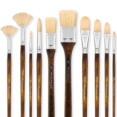 an assortment of paint brushes lined up against a white background