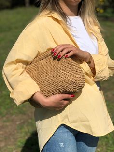 HANDMADE STRAW POUCH CLUTCH BAG 🛍️Inspired by nature sustainable fashion ✅Any woman must have this bag for every fashionista.Whether you keeping it to yourself or gifting someone you care, it will be unforgettable. Daily use, a fashionable women's accessory for special occasions ✅I made this beautiful clutch from natural paper rope which is organic cotton. ✅The interior of the straw summer bag is fully lined with cotton and has a hidden metal lock. A lining of the appropriate color is sewn into the crochet raffia bag.  ✨Handmade products ✨Natural raffia yarn ✨Premium duck (a special kind of fabric) lining ✨Ultra-careful craftsmanship   ✨High-quality special products for you  ✅You can combine your clothes with a straw summer bag on summer days. Suitable for use as handbag, make-up bag or p Everyday Clutch With Braided Handles, Chic Natural Color Straw Clutch Bag, Eco-friendly Natural Rectangular Pouch, Casual Natural Rectangular Clutch, Natural Woven Pouch Shoulder Bag, Natural Straw Pouch Bag For Spring, Natural Woven Straw Clutch, Natural Pouch Straw Bag For Spring, Natural Woven Clutch For Everyday Use