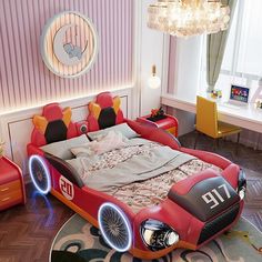 a child's bedroom with a bed made out of an old race car and lights