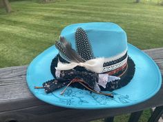 Brand New Hot off the press Each hat is uniquely designed!  Great for your next rodeo, fair, concert or trip!!   Message me for custom requests! Western Fedora Top Hat For Summer, Western Style Fedora Top Hat For Summer, Blue Western Hat For Kentucky Derby, Blue Hats For Rodeo And Kentucky Derby, Summer Top Hat For Western-themed Events With Flat Brim, Blue Fedora For Kentucky Derby And Country Events, Blue Country Hat With Short Brim, Blue Short Brim Country Hat, Adjustable Blue Country Style Fedora