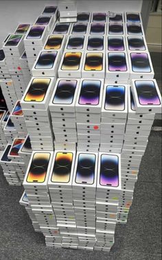 several stacks of iphones stacked on top of each other