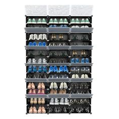 the shoe rack is filled with many pairs of shoes and plastic bins for storage