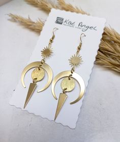 Long Witchy Sun and Moon Earrings 💫 . This pair is made of brass parts. No Nickel, no Lead. . The item will arrive at you wrapped as a gift in a little paper gift bag. . Here are some tips to ensure longevity with my pieces: 》 Avoid showering, swimming, and exercising with my pieces. 》 Avoid wearing perfumes with your jewelry. 》 Avoid sleeping with my pieces on.  》 When not in use, store items in a box. . If you have any questions please contact me, I usually respond quite fast 💌 . Thank you f Sun And Moon Earrings, Gothic Gifts, Lace Jewelry, Golden Earrings, Paper Gift Bags, Antique Lace, Moon Earrings, Pretty Earrings, Sun And Moon