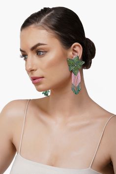 Beaded Handmade Earring in a Flower Shape with Drop Beads Hanging Attached with center back Pin Hand crafted in Green and Light Pink Colour Beads. Adorn yourself with the elegance of nature's beauty with our Flower Tassel Drop Earrings. These exquisite handcrafted earrings take on the form of delicate flowers, featuring a captivating design with drop beads that dangle gracefully, resembling nature's own petals. They are thoughtfully attached with a center back pin, ensuring a secure and comforta Elegant Multicolor Beaded Flower Earrings, Elegant Flower Earrings With Colorful Beads, Green Beaded Chandelier Earrings For Wedding, Green Flower-shaped Beaded Earrings With Dangling Beads, Handmade Earring, Tassel Drop Earrings, Delicate Flowers, Light Pink Color, Drop Beads