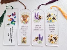 three tags with flowers and animals on them