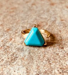 18k gold over brass, electroplated, adjustable, natural stone. Adjustable Gold Turquoise Gemstone Ring, Adjustable Gold Turquoise Ring In Spiritual Style, Adjustable Gold Spiritual Turquoise Ring, Gold Adjustable Turquoise Ring, Adjustable Gold Turquoise Ring, Unique Gold Open Turquoise Ring, Gold Turquoise Ring With Large Stone As Gift, Triangle Ring, Solitaire Rings