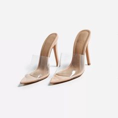 Step into style with these Nude Patent Leather transparent Mule Heels. The sleek design and transparent detail add a modern touch to any outfit, perfect for a sophisticated and chic look. Color: nude Heel Type: stiletto heel Heel height: 4.33 inches/ 11 cm Toe：pointed toe Handcrafted US sizing. Fits true to size. Modern High Heel With Translucent Outsole, Trendy Formal Heels With Translucent Outsole, Chic Heels With Clear Strap And Open Heel, Chic Open Toe Heels With Clear Strap, Chic Open Toe Heels With Transparent Straps, Trendy Clear Heels With Transparent Straps, Modern Clear Strap Heels, Modern Clear Heels With Clear Strap, Clear High Heels With Transparent Straps