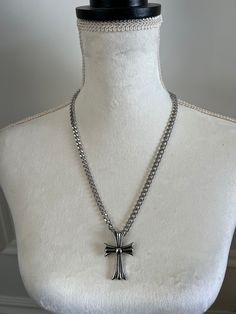 "NECKLACE FEATURES:  -CHAIN : 2DC STAINLESS STEEL 1.6MM  -LARGE CROSS MEASUREMENTS - 50 X 80MM  -LARGE CROSS HIGH POLISHED STAINLESS STEEL   I AM WEARING 22\" LENGTH IN THE IMAGES - DROP DOWN LENGTH OPTION AVAILABLE QUANTITY - 1 NECKLACE 1 CROSS PENDANT  NECKLACE DOES NOT HAVE INCH EXTENSION, PLEASE MEASURE ACCORDINGLY  WATER PROOF | TARNISH RESISTANT THERE IS A NO RETURN, NO EXCHANGE POLICY FOR THIS ITEM | FINAL SALE JEWELRY CARE INSTRUCTIONS Fashion jewelry tarnishes when exposed to moisture, Gothic Stainless Steel Silver Chain Jewelry, Punk Style Metal Cross Jewelry, Gothic Silver Necklace With Clavicle Chain, Silver Gothic Necklace With Clavicle Chain, Silver Gothic Clavicle Chain Necklace, Gothic Silver Stainless Steel Necklace, Punk Style Silver Stainless Steel Necklaces, Punk Style Silver Nickel-free Necklace, Silver Stainless Steel Punk Necklaces