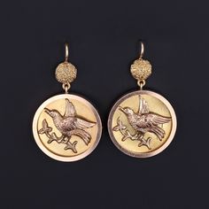 Swallows were a common motif in Victorian and Edwardian jewelry symbolic of faithful love and a safe return home. These earrings were converted from antique cufflinks (circa 1880-1900). The earrings feature finely rendered birds of 14k gold. Each earring measures 1.6 inches from the top of the ear wire to bottom by 0.95 inches wide and are in excellent condition. We have many other fantastic offerings of period fine and costume jewelry posted on our Etsy store, so please consider browsing our ot Antique 14k Gold Hallmarked Earrings, Victorian Hallmarked 14k Gold Earrings, Antique Engraved Drop Earrings, Antique Hallmarked 14k Gold Earrings, Victorian 14k Gold Earrings, Antique Yellow Gold Earrings For Formal Events, Antique Yellow Gold Earrings For Formal Occasions, Victorian Engraved Drop Earrings, Victorian Engraved Earrings For Formal Occasions