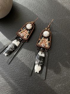 Длинные серьги с вышивкой из говлита и яшмы. - Etsy Украина Artisan Beaded Fringe Earrings As Gift, Artisan Beaded Fringe Earrings For Gifts, Artisan Beaded Dangle Earrings With Natural Stones, Artisan Dangle Beaded Earrings With Natural Stones, Artisan Natural Stone Beaded Dangle Earrings, Artisan Natural Stone Dangle Beaded Earrings, Bohemian White Beaded Earrings, Bohemian White Earrings With Natural Stones, White Bohemian Earrings With Natural Stones