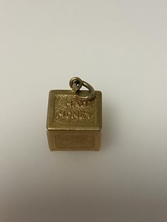 Vintage 14k yellow gold mad money, dollar charm. The charm weighs 4.83 grams of gold. Vintage Yellow Gold Jewelry With Logo Charm, Gold Jewelry With Logo Charm For Collectors, Formal Yellow Gold Jewelry With Logo Charm, Classic Engraved Yellow Gold Charms, 14k Gold Good Luck Pendant Charms, Gold Jewelry With Logo Charm For Anniversary, Elegant 14k Gold Collectible Charms, 14k Yellow Gold Charms For Anniversary, Elegant 14k Gold Charms For Collectors