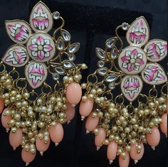 "These handcrafted painted meenakari earrings with amritsari kundan are oh so stunning! Available in several colors The earrings are approximately 3.5 \" long & 2.25 \" wide. Pictures are taken in room light indoors. Please contact if you have any questions. Thanks!" Traditional White Hand Painted Earrings, Traditional White Hand-painted Earrings, Traditional Hand Painted White Earrings, Multicolor Meenakari Danglers For Diwali, Multicolor Meenakari Chandbali Danglers, Diwali Multicolor Meenakari Danglers, Festive Kundan Earrings With Motifs, Kundan Earrings With Motifs For Diwali, Traditional Kundan Earrings With Motifs